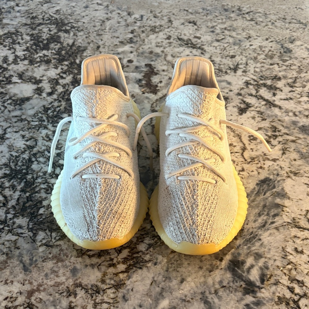 Yeezy Cream and Yellow Athletic Shoes